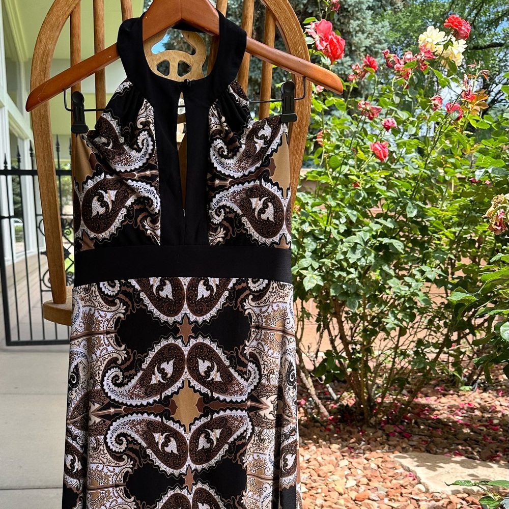 Festival fun black pattern dress. Keyhole neck open back. Size M.